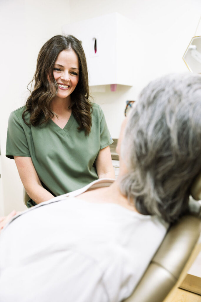 Biological dentist near Centennial caring for a patient