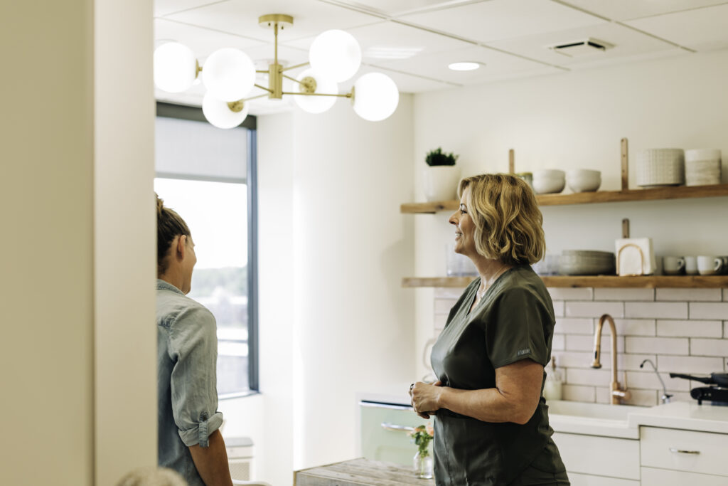 Breast cancer dental care consultation with a biological dental team member in a calm Denver office
